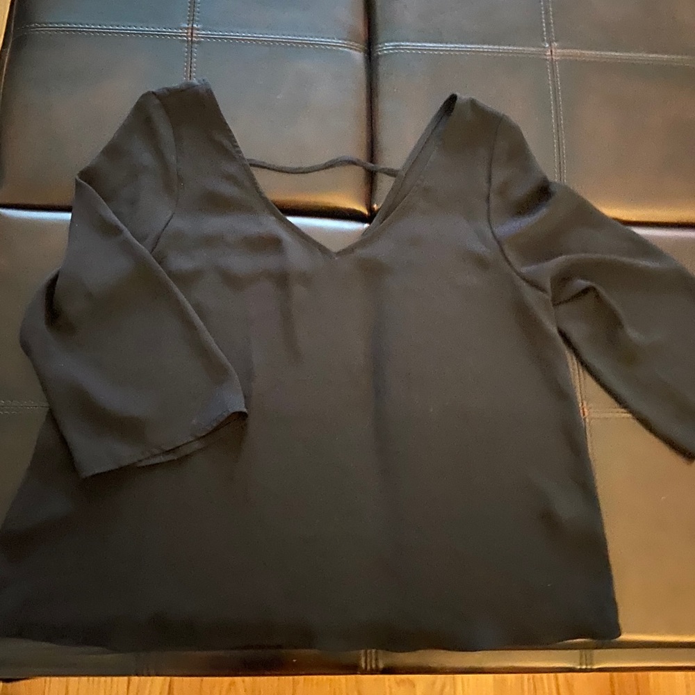 Loose fitting 3/4 length bell sleeve crop top